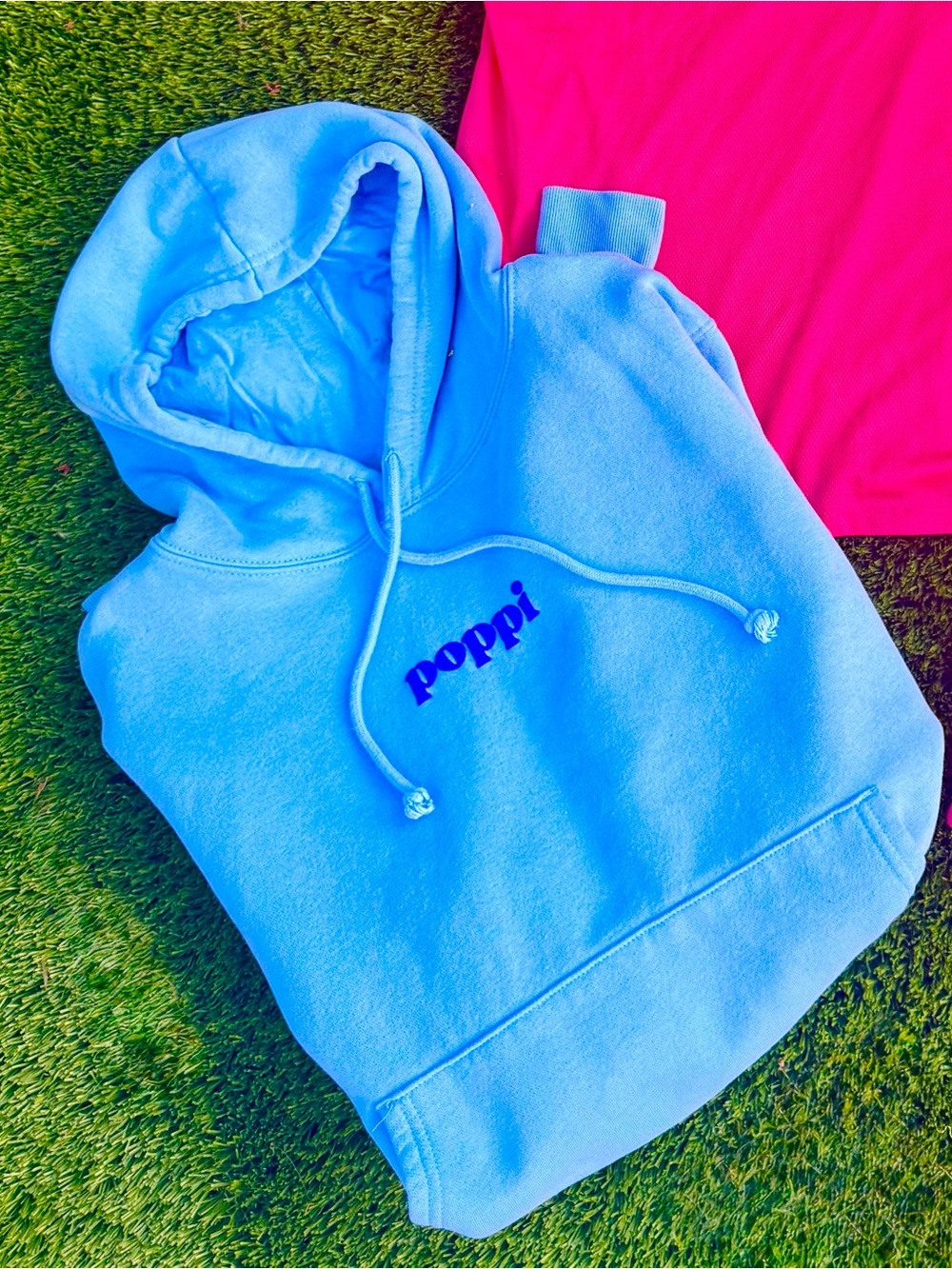 Official Poppi Women’s logo hoodie light blue sz Lg. ‘The Future Served Fresh’